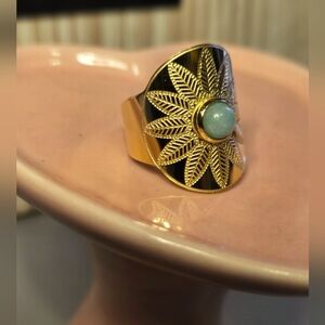 Plunder Ellie adjustable ring. Gold flower engraved with turquoise stone center